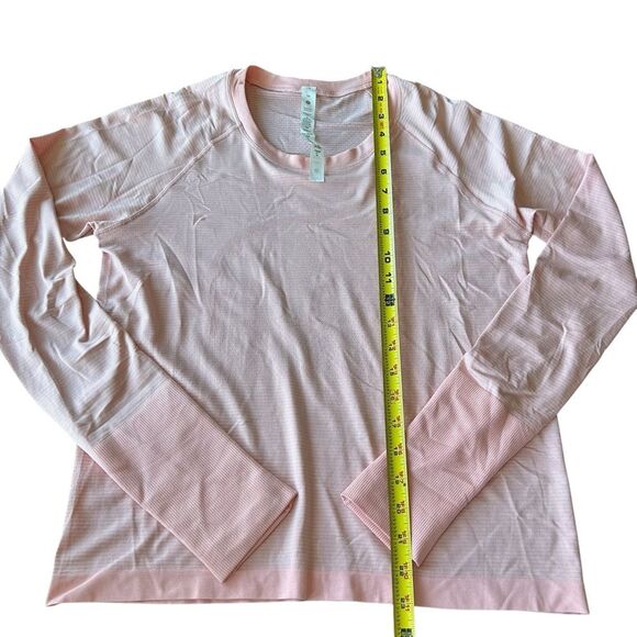 Lululemon Women’s 10 Swiftly Tech Long Sleeve Shirt 2.0
Dew Pink Hip Length New - Picture 10 of 10